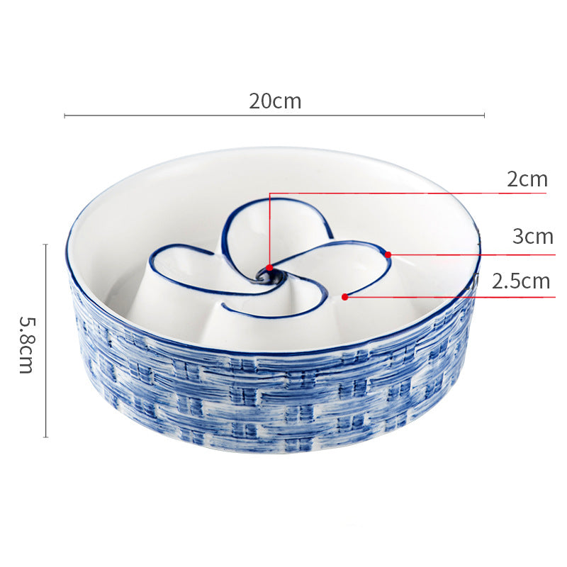 Ceramic bowl with blue patterns and measurements on a white background