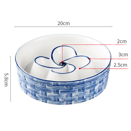 Ceramic bowl with blue patterns and measurements on a white background